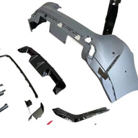 Kit exterior complet compatibil BMW Seria 4 G22/G23 (2020+), aspect M4 – vedere de sus cu toate componentele: bară față, bară spate, grile, difuzor, praguri.