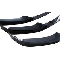 Splitter bară față BMW Seria 5 G30 (2017–2020), 3 piese, model sport M-Tech, finisaj lucios negru și carbon, vedere frontală pe fundal alb.