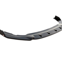 Prelungire bară față Gloss Black pentru Volkswagen Golf 8, piesă aftermarket din ABS, design sportiv, prezentare frontală detaliată.