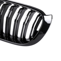 Set grile față BMW X3 F25 (2014–2018), design dublu-rinichi M Look, finisaj negru lucios, plastic ABS rezistent, vedere frontală pe fundal alb.