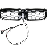 Grilă LED Diamant LCI pentru BMW Seria 3 G20 (2023+), finisaj negru lucios, design tip fagure, set complet cu cabluri de conectare vizibile pe fundal alb.