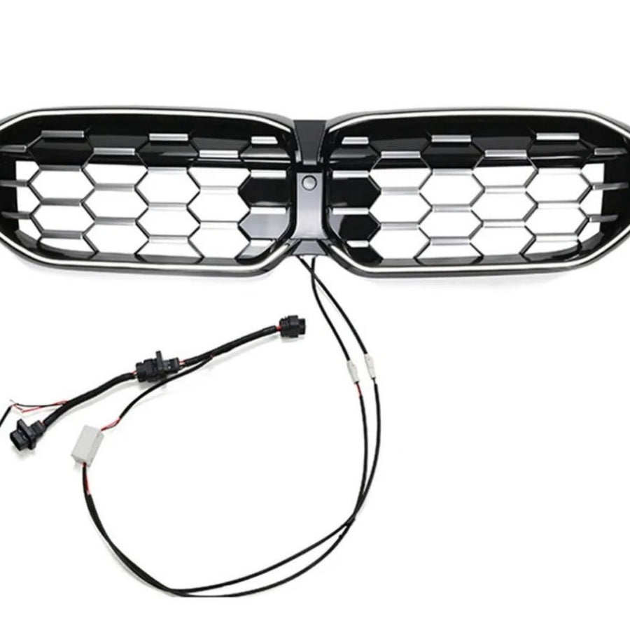 Grilă LED Diamant LCI pentru BMW Seria 3 G20 (2023+), finisaj negru lucios, design tip fagure, set complet cu cabluri de conectare vizibile pe fundal alb.