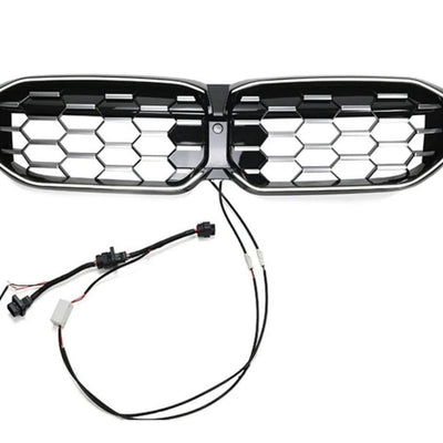 Grilă LED Diamant LCI pentru BMW Seria 3 G20 (2023+), finisaj negru lucios, design tip fagure, set complet cu cabluri de conectare vizibile pe fundal alb.