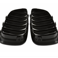 Vedere frontală a unei grile față tip M5 Look pentru BMW Seria 5 F10 (2011–2018), material ABS negru lucios, componentă aftermarket.