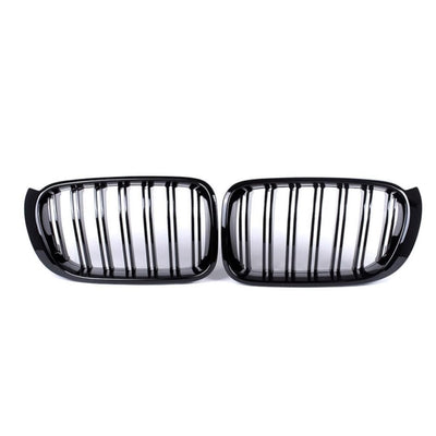 Grile frontale duble pentru BMW X5 F15 și BMW X6 F16, compatibile 2015–2018, design clasic cu lamele verticale, finisaj negru lucios, vedere frontală.