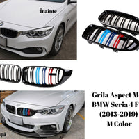 Pereche grile față BMW Seria 4 F32 compatibile 2013–2019, design M4 Look, finisaj negru lucios cu detalii colorate M (roșu și albastru).