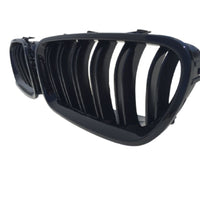 Vedere frontală a unei grile față tip M5 Look pentru BMW Seria 5 F10 (2011–2018), material ABS negru lucios, componentă aftermarket.