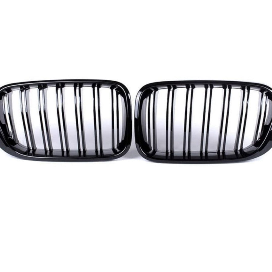 Set grile față BMW X3 F25 (2014–2018), design dublu-rinichi M Look, finisaj negru lucios, plastic ABS rezistent, vedere frontală pe fundal alb.