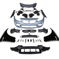 Imagine frontală cu toate componentele kitului exterior Wide Body M2 Competition pentru BMW Seria 2 F22, inclusiv bare, grile, aripi și praguri laterale