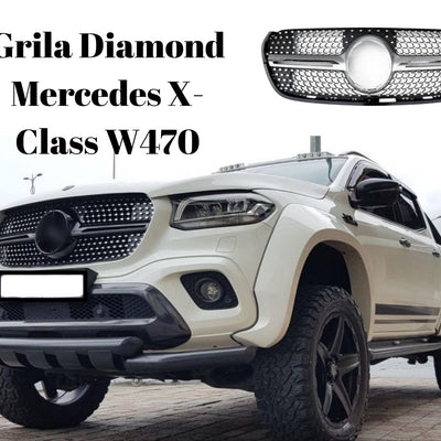 Mercedes X-Class W470 alb echipat cu grilă frontală Diamond crom-negru, fotografie unghi față-jos, aspect premium și sportiv.