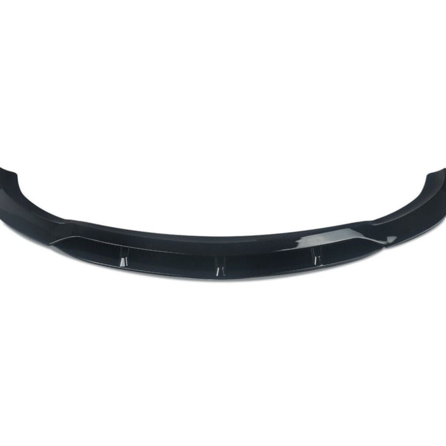 Prelungire bară față BRABUS pentru Mercedes-Benz E-Class W213 (2016-2019), piesă aftermarket din fibră de carbon, culoare negru lucios, vedere frontală pe fundal alb.