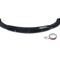 Prelungire bară față BRABUS pentru Mercedes-Benz E-Class W213 (2016-2019), piesă aftermarket din fibră de carbon, culoare negru lucios, vedere frontală pe fundal alb.