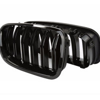 Vedere frontală a unei grile față tip M5 Look pentru BMW Seria 5 F10 (2011–2018), material ABS negru lucios, componentă aftermarket.