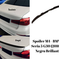 Vedere din spate a spoilerului tip M4 montat pe un BMW Seria 5 G30 alb, accentuând designul sportiv. Compatibil cu modelele din 2016+, fabricat din ABS negru lucios.
