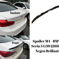 Vedere din spate a spoilerului tip M4 montat pe un BMW Seria 5 G30 alb, accentuând designul sportiv. Compatibil cu modelele din 2016+, fabricat din ABS negru lucios.