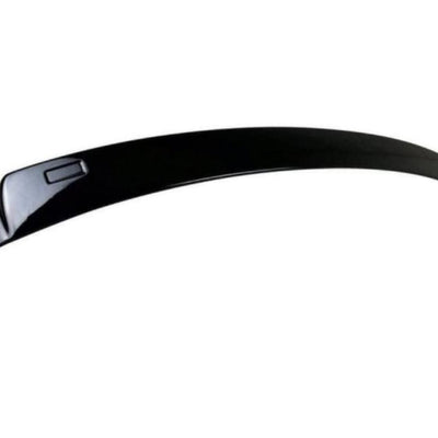 Spoiler auto negru brillant pentru BMW Seria 3 E90 sedan, model 2005–2012, piesă aftermarket din ABS, vedere din lateral pe fundal alb.